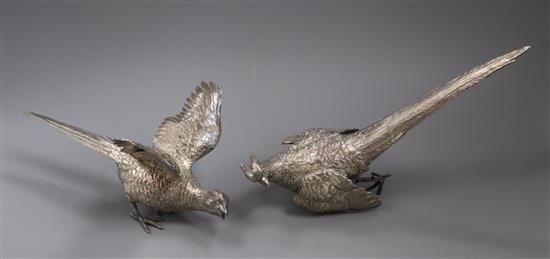 Two sterling models of freestanding grouse, gross 21 oz.